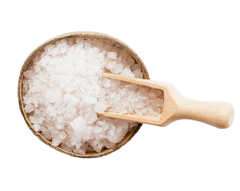 Bowl of coarse sea salt with a wooden scoop.